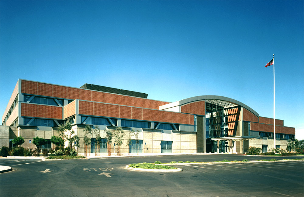 Image 5. Corner view of building entrance from parking lot.