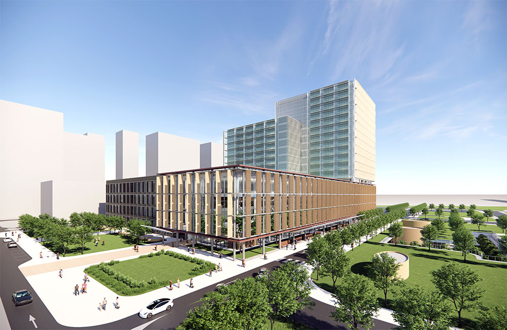 Image 1. Rendering showing corner view of hospital. A 4-story glass and steel modern building is located in the foreground with evenly spaced vertical fins providing shade from the sun. Also 2 additional high-rise towers can be seen at the far end of the large complex.